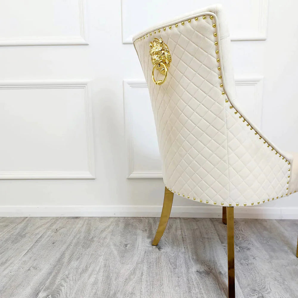 Valeo Gold 180cm Dining Table with Polar White Sintered Stone Top + 4 x cream and Gold Lion Knocker Dining Chairs